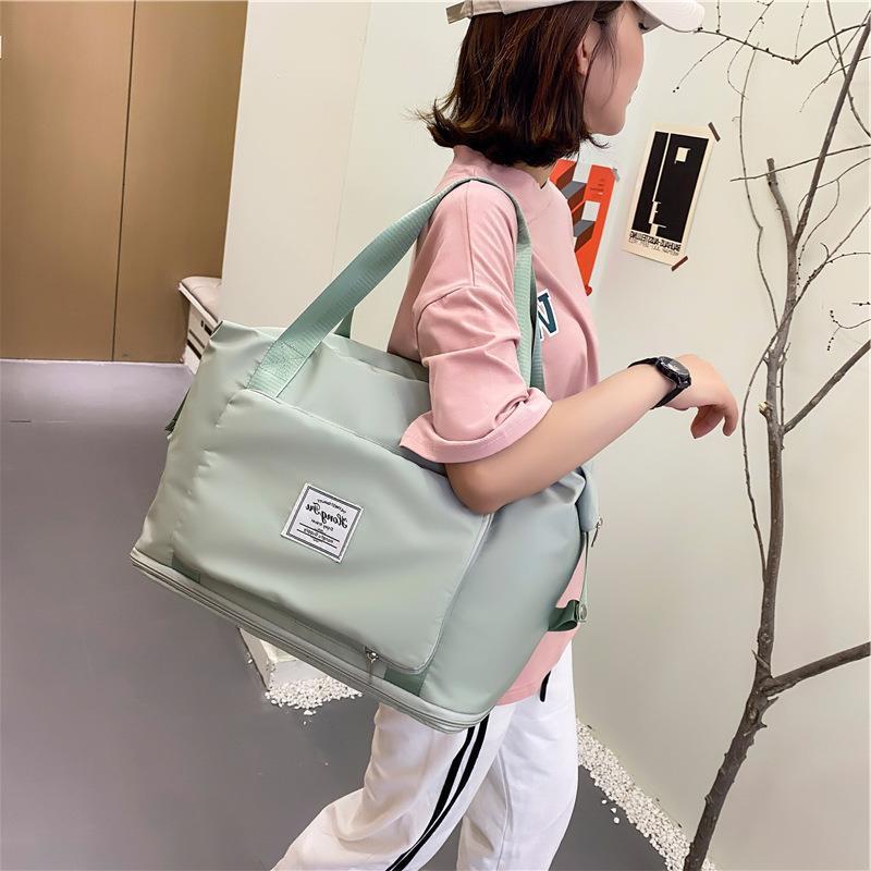 Foldable travel bag Waterproof travel bag Large capacity gym bag Women's fitness bag Weekender overnight bag Foldable gym bag Waterproof gym bag Travel bag for women Fitness travel bag Women's weekender bag Overnight travel bag Durable travel bag Women's foldable bag Stylish travel bag Practical travel bag